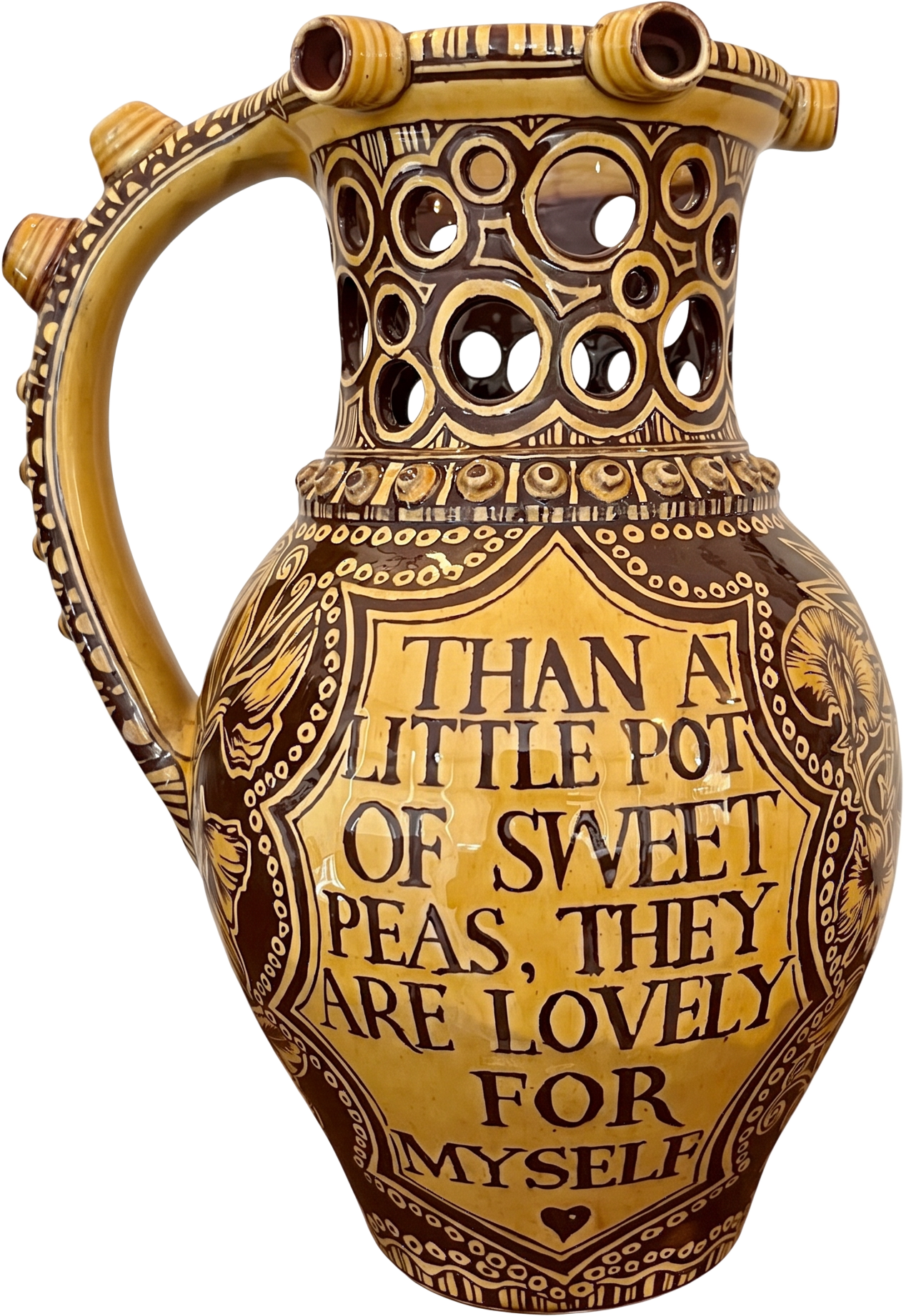 A finished sgraffito puzzle jug inscribed 'Than a little pot of sweet peas, they are lovely for myself'.